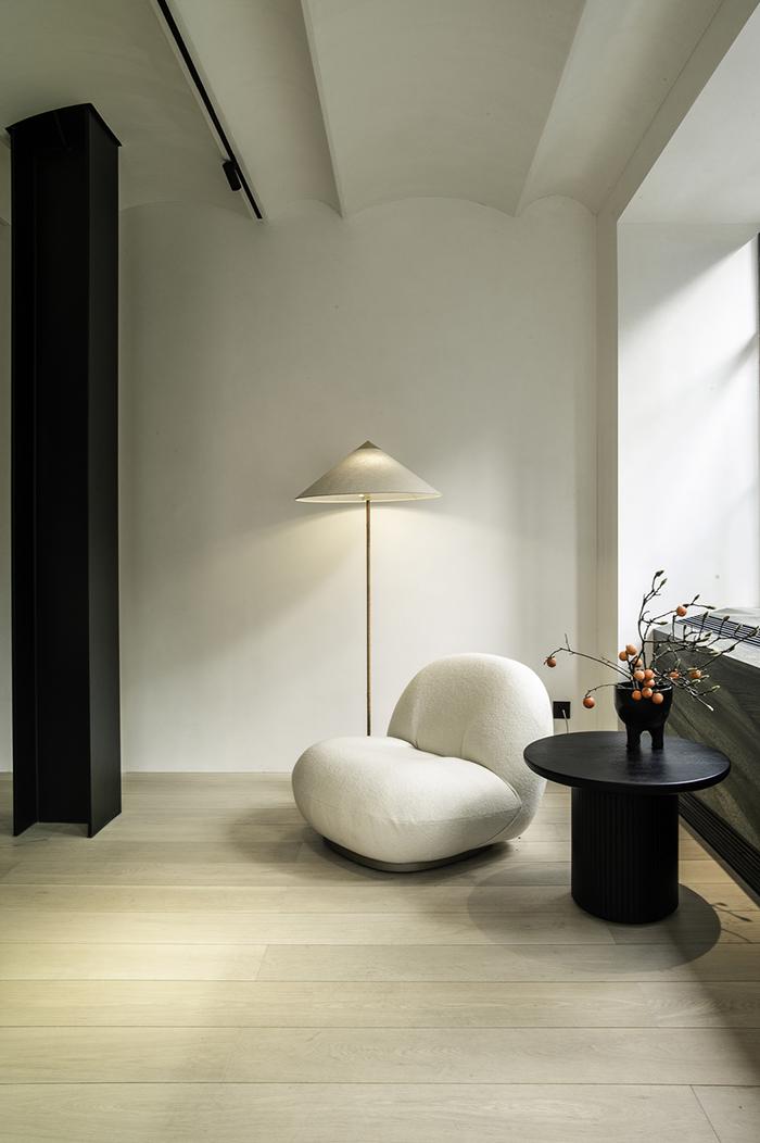 GUBI armchair with swivel base PACHA LOUNGE CHAIR