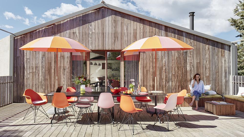 VITRA Eames Plastic Armchair with cushion and black base DAR NEW DIMENSIONS