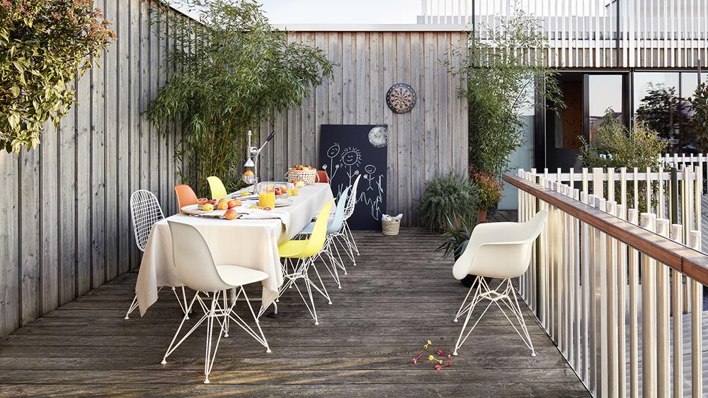 VITRA Eames Plastic Armchair with cushion and black base DAR NEW DIMENSIONS