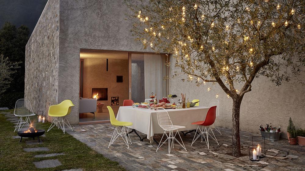 VITRA Eames Plastic Armchair with cushion and black base DAR NEW DIMENSIONS