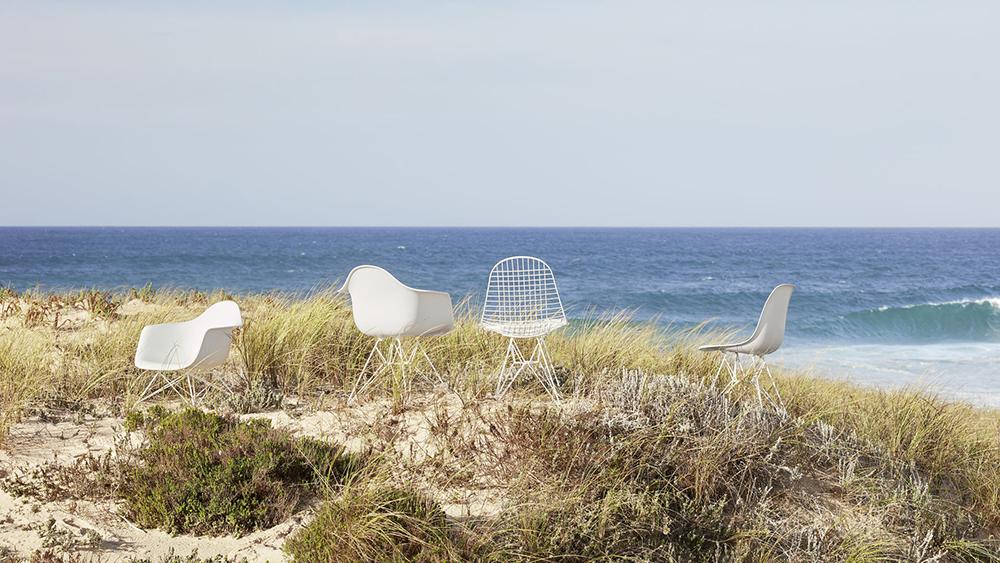 VITRA Eames Plastic Armchair with cushion and black base DAR NEW DIMENSIONS